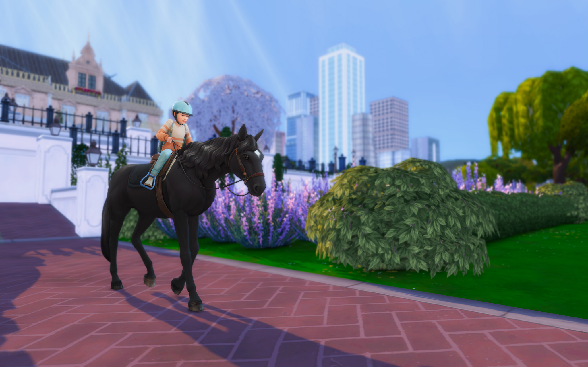 Ennik wears a helmet and cautiously rides Midnight through the park that surrounds her home. 